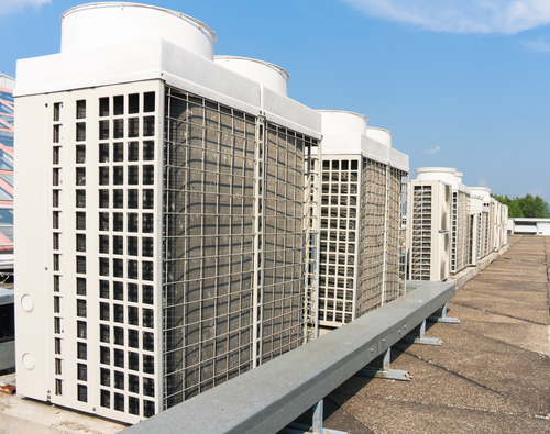 Industrial,air,conditioner,condensers,(outside,unit),on,the,roof,of
